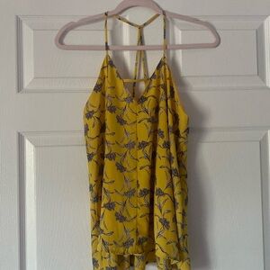 Woman’s top , yellow with floral